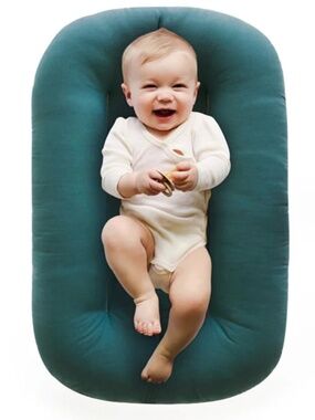 Snuggle Me Organic infant lounger with washable cotton cover in moss